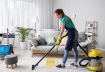 women cleaning carpet