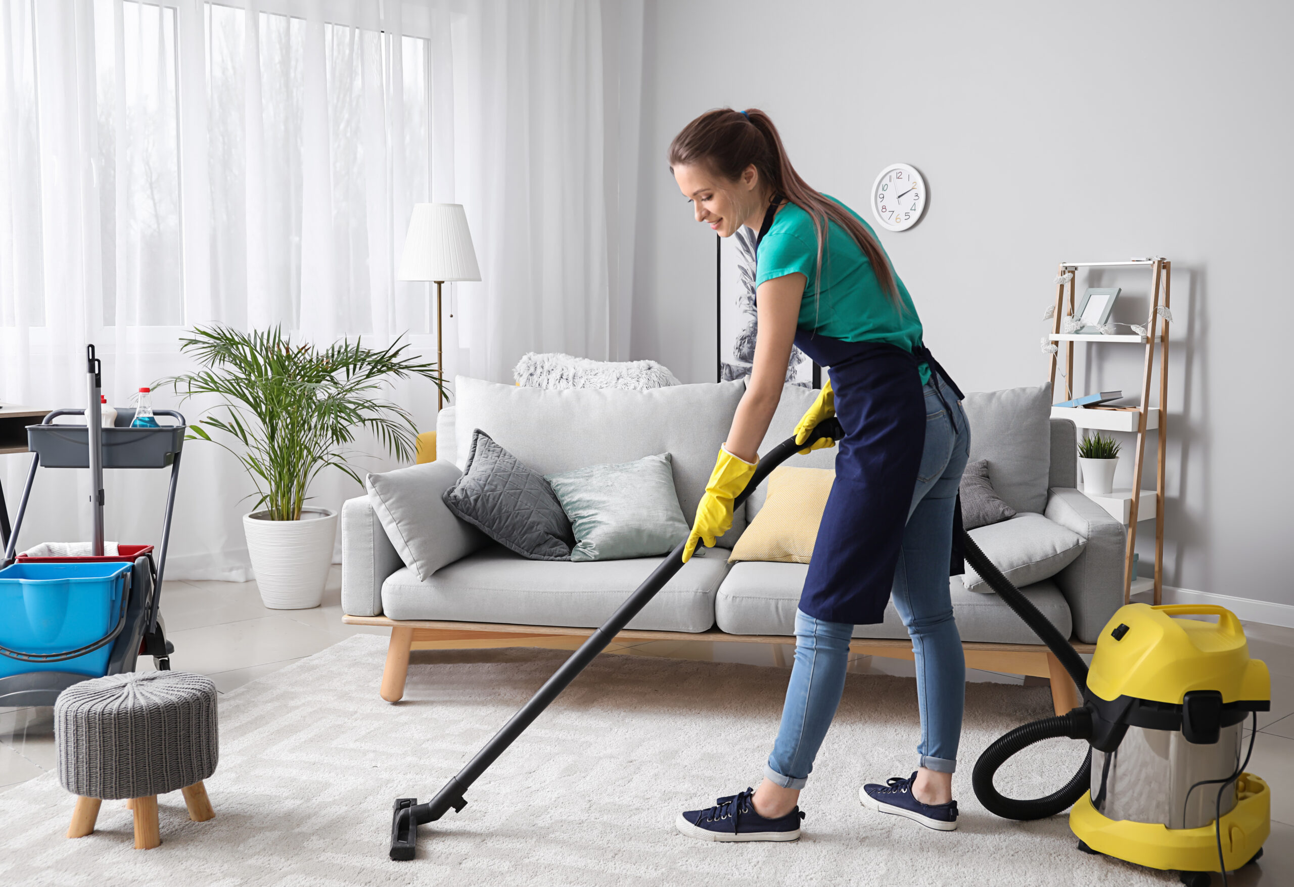 women cleaning carpet